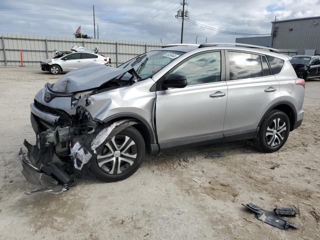 TOYOTA RAV4 LE 2018 with VIN 2T3ZFREV3JW425658 - Photo from auction