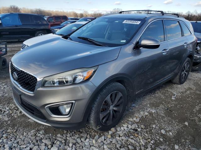 KIA SORENTO EX 2016 with VIN 5XYPHDA58GG074392 - Photo from auction