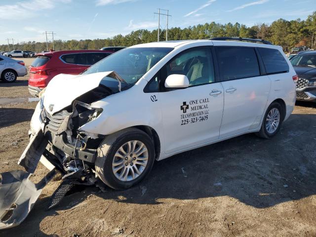 TOYOTA SIENNA XLE 2011 with VIN 5TDYK3DC3BS077108 - Photo from auction