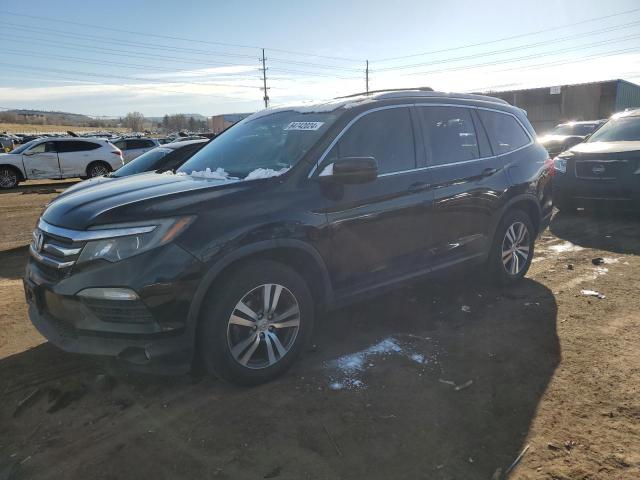 HONDA PILOT EXL 2018 with VIN 5FNYF6H59JB002028 - Photo from auction