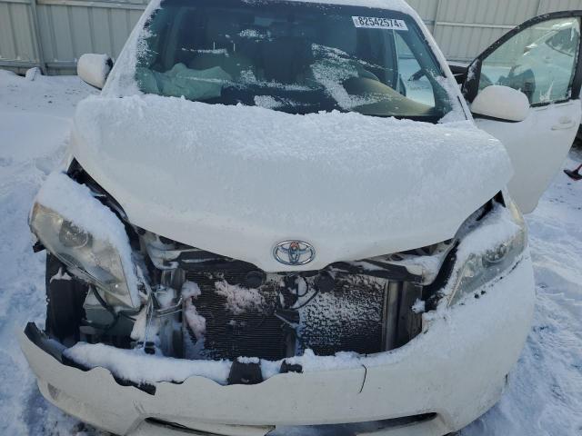 Photo 12 from auction – 2012 TOYOTA SIENNA XLE with VIN 5TDYK3DC9CS259719