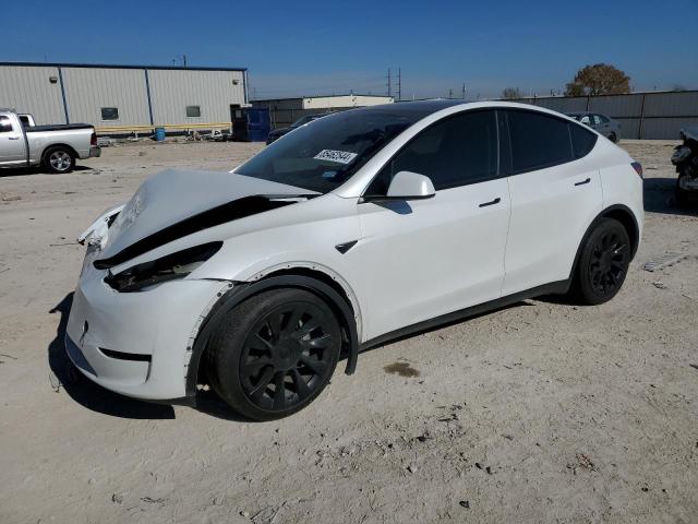 TESLA MODEL Y 2023 with VIN 7SAYGAEE2PF760955 - Photo from auction