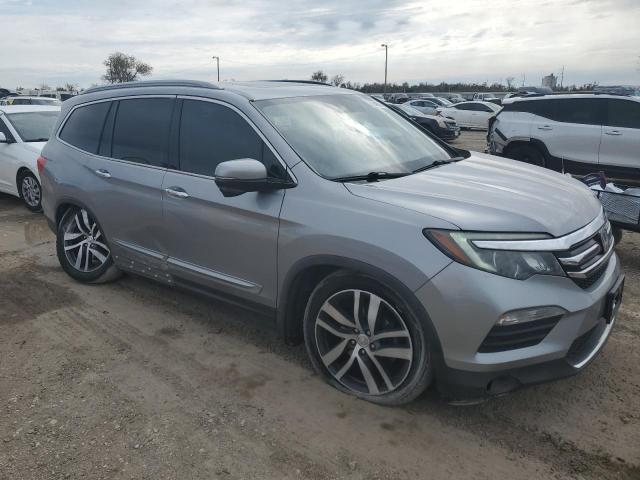 Photo 4 from auction – 2018 HONDA PILOT TOUR with VIN 5FNYF5H9XJB007882