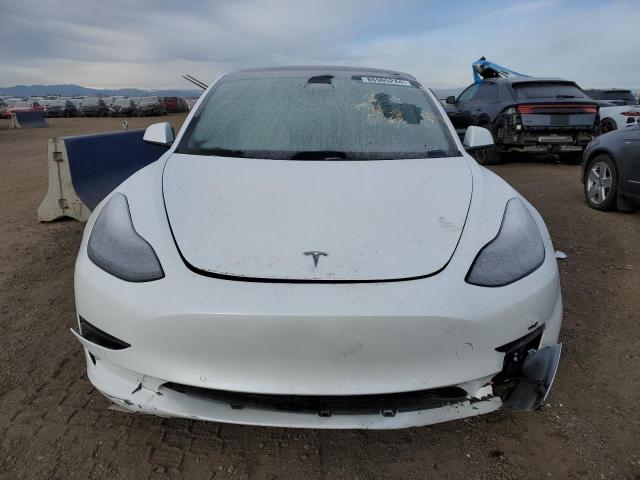 Photo 5 from auction – 2021 TESLA MODEL 3 with VIN 5YJ3E1EA2MF995054