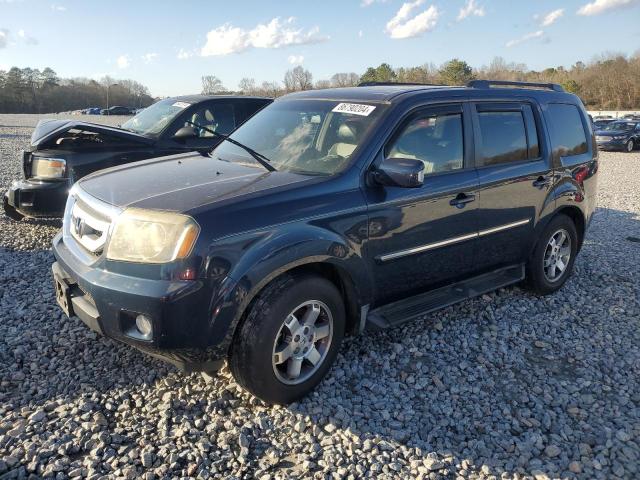 HONDA PILOT TOUR 2009 with VIN 5FNYF38979B003899 - Photo from auction