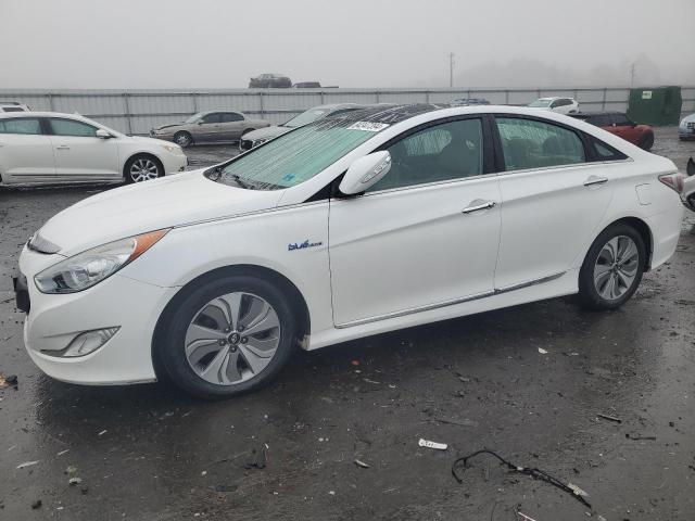 HYUNDAI SONATA HYB 2015 with VIN KMHEC4A46FA131552 - Photo from auction