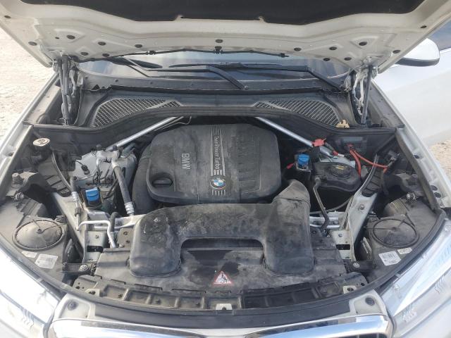 Photo 12 from auction – 2014 BMW X5 XDRIVE3 with VIN 5UXKS4C50E0J95430