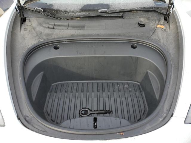 Photo 11 from auction – 2021 TESLA MODEL 3 with VIN 5YJ3E1EA2MF995054