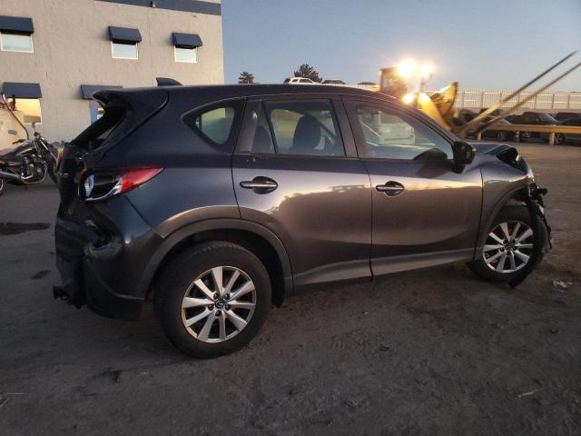 Photo 3 from auction – 2014 MAZDA CX-5 SPORT with VIN JM3KE2BE0E0371771