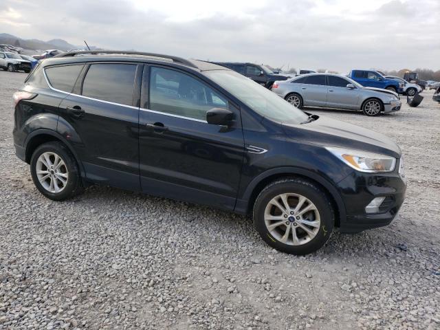 Photo 4 from auction – 2018 FORD ESCAPE SE with VIN 1FMCU9GD5JUA21074