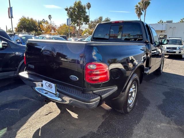 Фото 4 с аукциона – 2000 FORD F150 с VIN 1FTRX07L8YKA69876