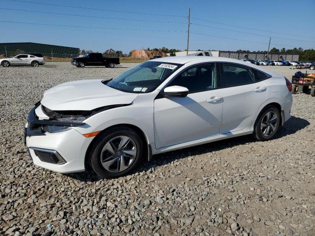 HONDA CIVIC LX 2019 with VIN 2HGFC2F65KH586395 - Photo from auction
