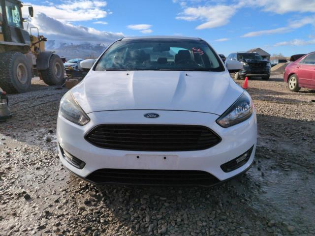 Фото 5 с аукциона – 2018 FORD FOCUS SE с VIN 1FADP3FE8JL223555