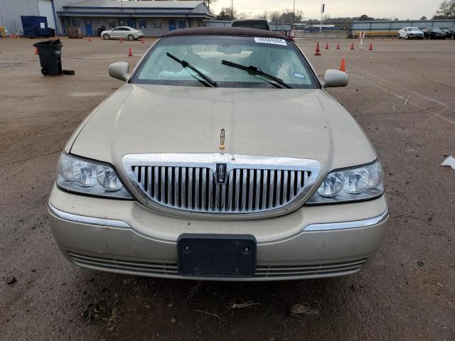 Photo 5 from auction – 2004 LINCOLN TOWN CAR E with VIN 1LNHM81W14Y635093