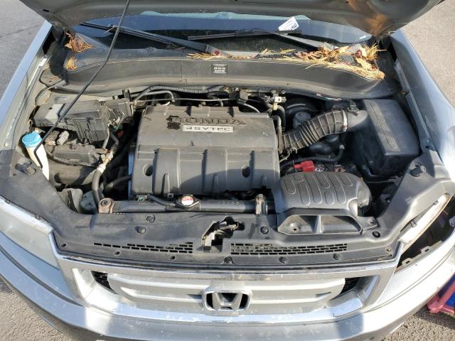 Photo 12 from auction – 2009 HONDA RIDGELINE with VIN 5FPYK16549B102302