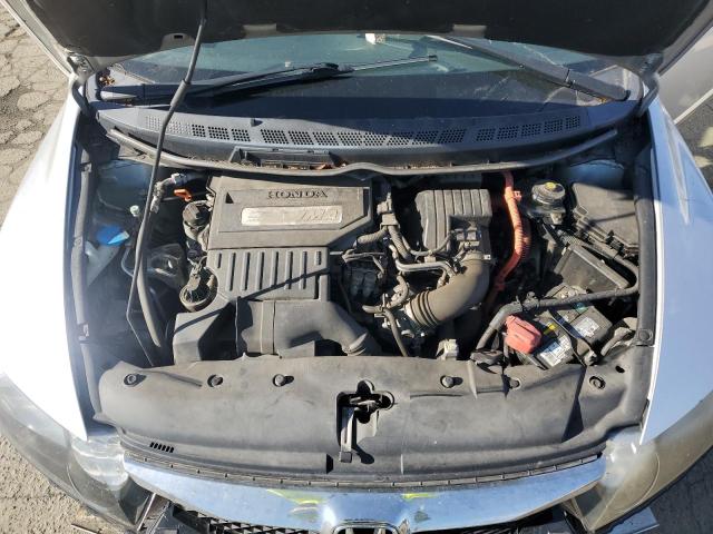Photo 11 from auction – 2011 HONDA CIVIC HYBR with VIN JHMFA3F2XBS000482