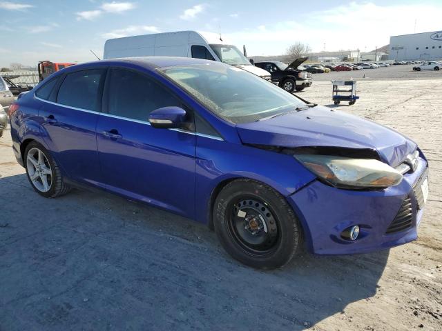 Photo 4 from auction – 2014 FORD FOCUS TITA with VIN 1FADP3J29EL321058