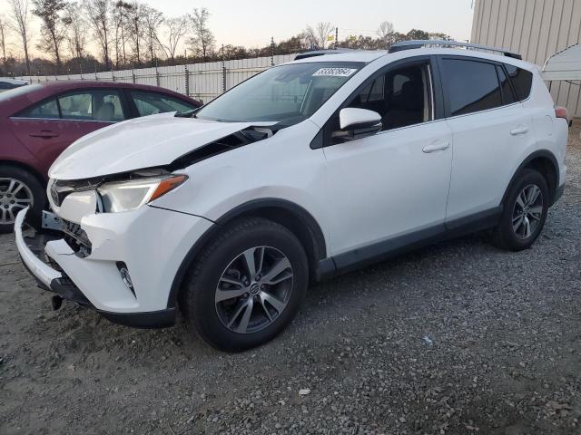 TOYOTA RAV4 XLE 2017 with VIN 2T3RFREV8HW595914 - Photo from auction
