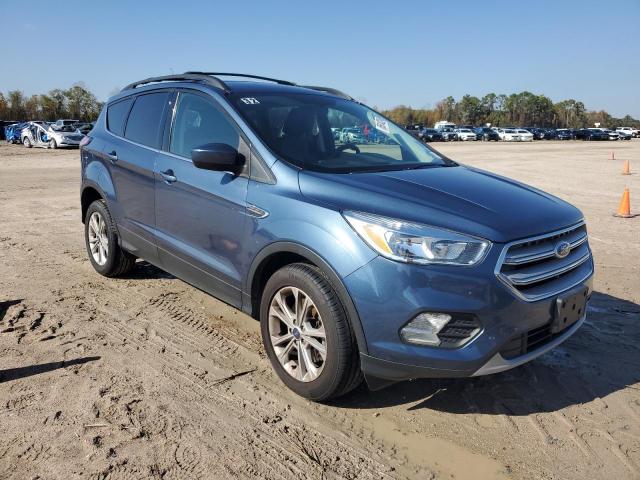 Photo 4 from auction – 2018 FORD ESCAPE SE with VIN 1FMCU9GD4JUC01551