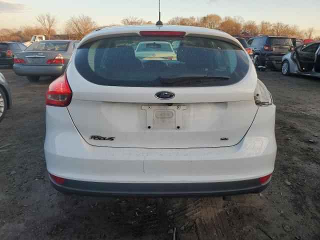 Photo 6 from auction – 2018 FORD FOCUS SE with VIN 1FADP3K26JL329823