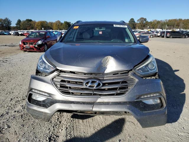 Photo 5 from auction – 2017 HYUNDAI SANTA FE S with VIN 5NMZU3LB2HH027173