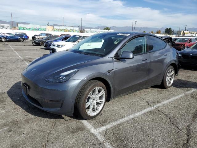 TESLA MODEL Y 2023 with VIN 7SAYGDEE0PF899743 - Photo from auction