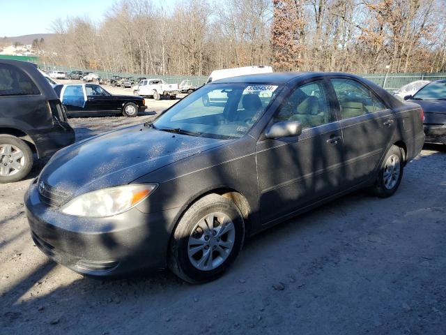 TOYOTA CAMRY LE 2004 with VIN 4T1BF32K84U588621 - Photo from auction