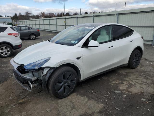 TESLA MODEL Y 2024 with VIN 7SAYGAEEXRF185331 - Photo from auction