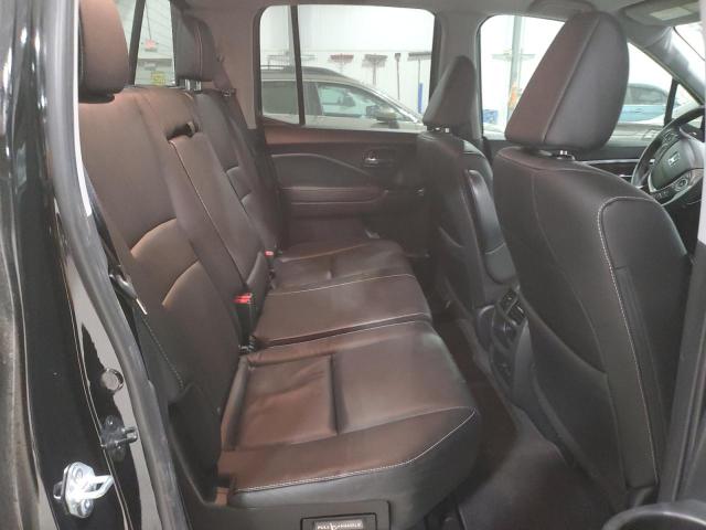 Photo 10 from auction – 2021 HONDA RIDGELINE with VIN 5FPYK3F50MB006042