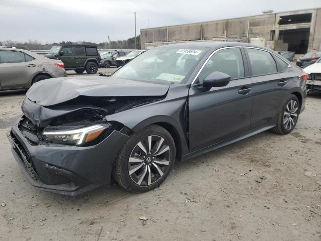 HONDA CIVIC EX 2024 with VIN 2HGFE1F71RH338295 - Photo from auction
