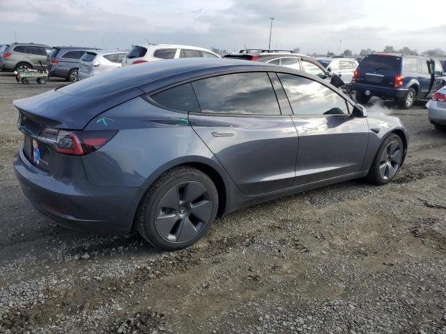 Photo 3 from auction – 2022 TESLA MODEL 3 with VIN 5YJ3E1EBXNF256640