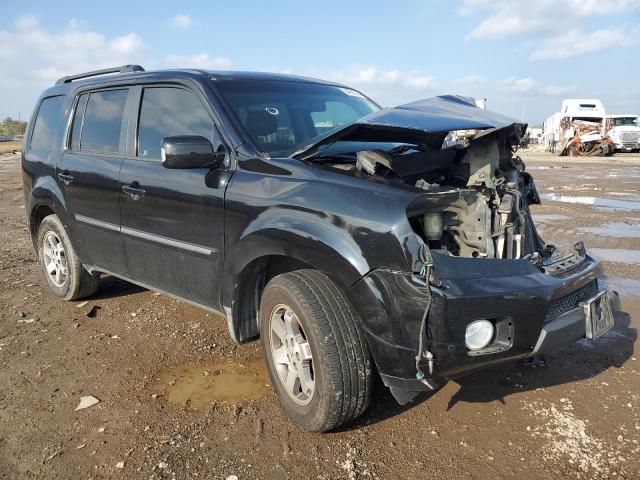 Photo 4 from auction – 2011 HONDA PILOT TOUR with VIN 5FNYF3H9XBB010769