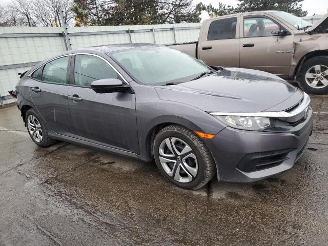 Photo 4 from auction – 2016 HONDA CIVIC LX with VIN 19XFC2F50GE071975