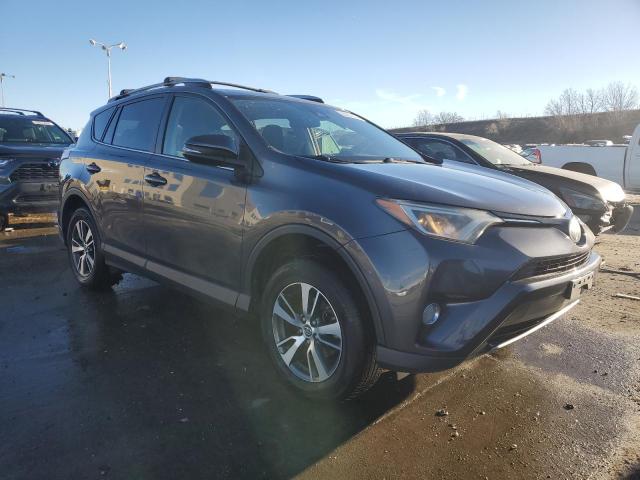 Photo 4 from auction – 2017 TOYOTA RAV4 XLE with VIN JTMRFREV7HJ173325