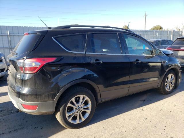 Photo 3 from auction – 2017 FORD ESCAPE SE with VIN 1FMCU9GD6HUA37133