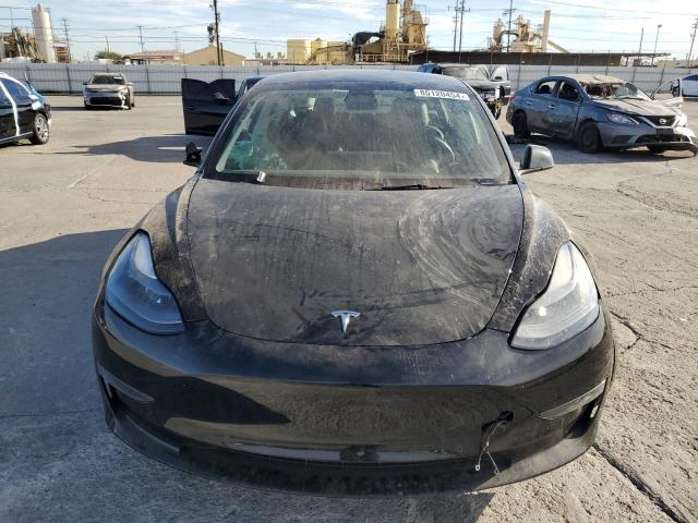 Снимка 5 от търг – 2022 TESLA MODEL 3 с VIN 5YJ3E1EAXNF374713