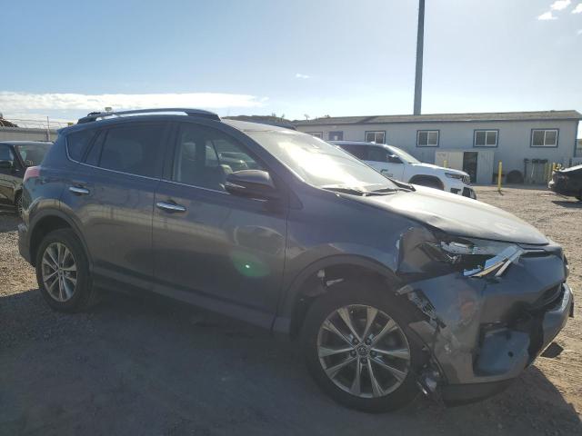 Photo 4 from auction – 2018 TOYOTA RAV4 LIMIT with VIN JTMYFREV5JD122003