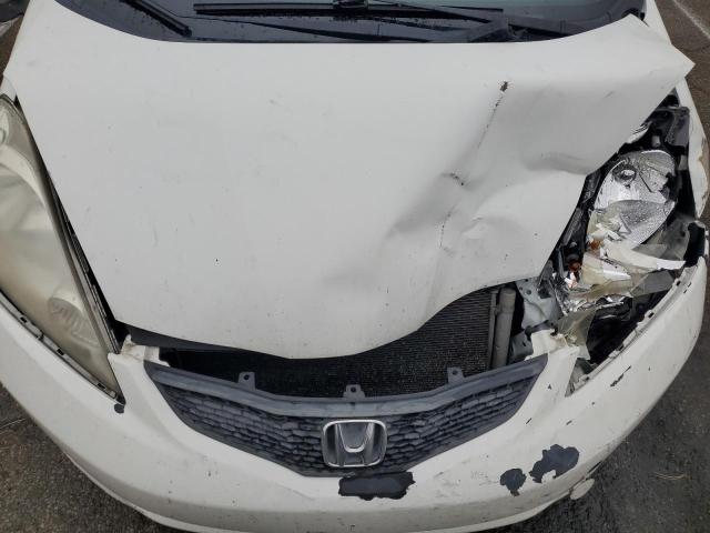 Photo 11 from auction – 2009 HONDA FIT with VIN JHMGE88609S056818