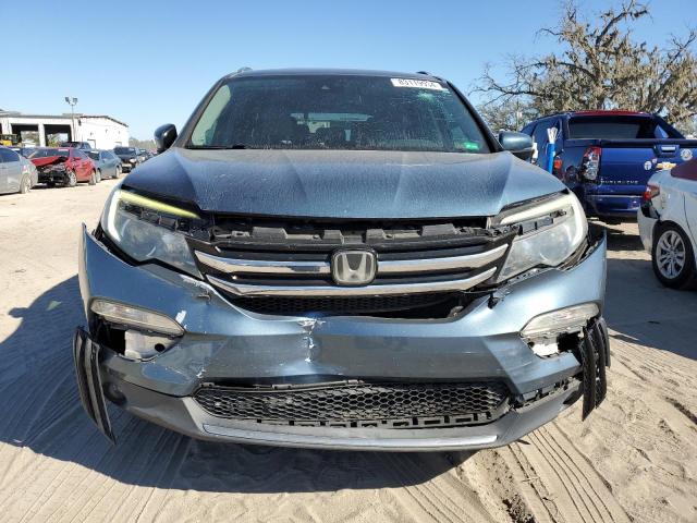 Photo 5 from auction – 2017 HONDA PILOT TOUR with VIN 5FNYF5H91HB034415