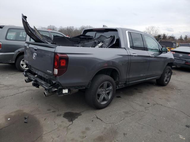 Photo 3 from auction – 2022 HONDA RIDGELINE with VIN 5FPYK3F73NB017541