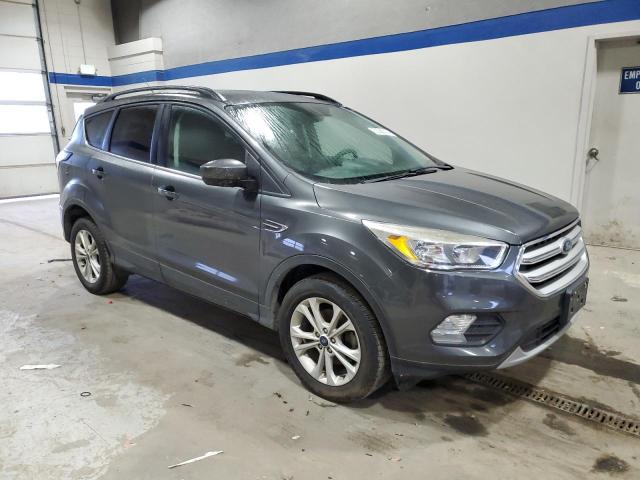 Photo 4 from auction – 2018 FORD ESCAPE SE with VIN 1FMCU0GD2JUD55428