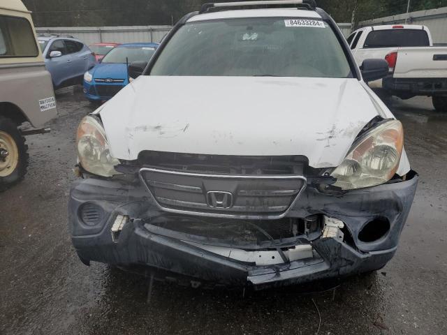 Photo 11 from auction – 2005 HONDA CR-V LX with VIN JHLRD68595C019363
