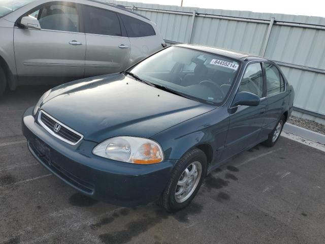 Photo 1 from auction – 1997 HONDA CIVIC EX with VIN JHMEJ854XVS002832