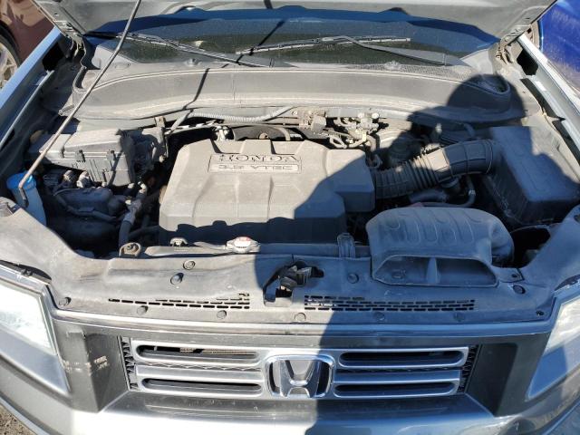Photo 11 from auction – 2007 HONDA RIDGELINE with VIN 2HJYK16587H504173