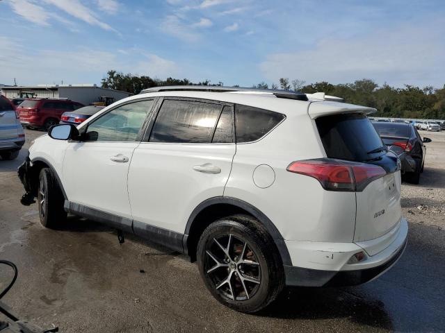 Photo 2 from auction – 2017 TOYOTA RAV4 SE with VIN JTMNFREV8HD103006