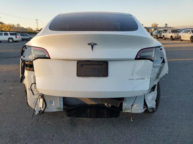 Photo 6 from auction – 2021 TESLA MODEL Y with VIN 5YJYGDEE3MF276903