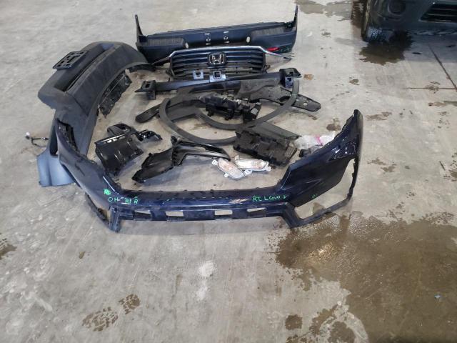 Photo 12 from auction – 2023 HONDA RIDGELINE with VIN 5FPYK3F53PB016360