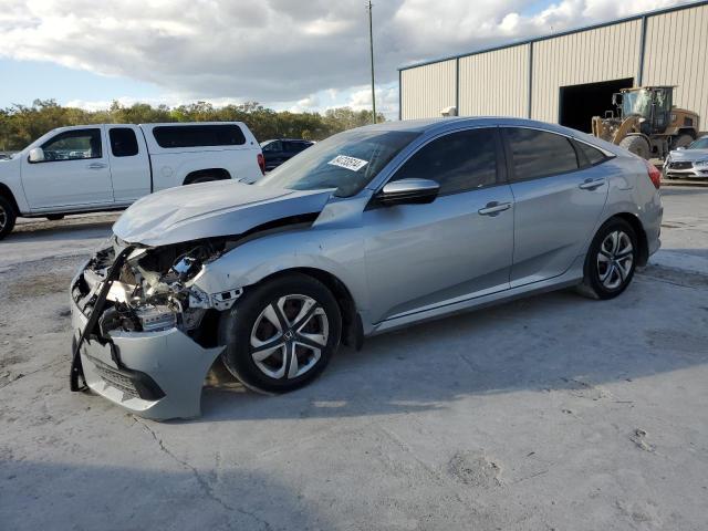 HONDA CIVIC LX 2018 with VIN 2HGFC2F58JH521448 - Photo from auction