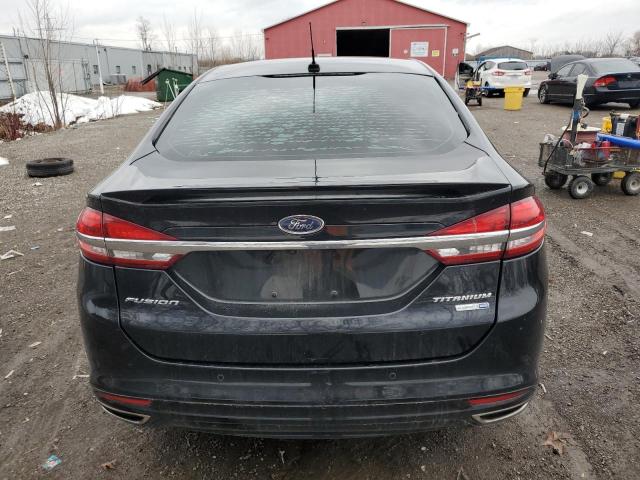 Photo 6 from auction – 2017 FORD FUSION TIT with VIN 3FA6P0D98HR345423
