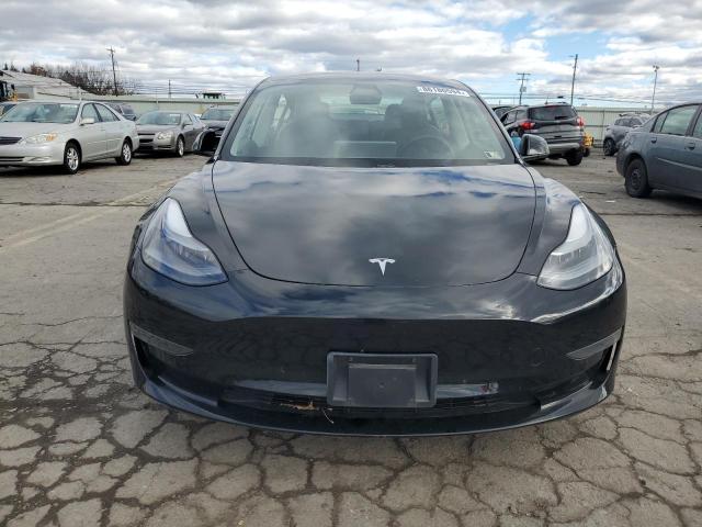 Photo 5 from auction – 2021 TESLA MODEL 3 with VIN 5YJ3E1EA2MF017685